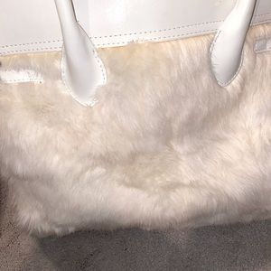 White on white real fur handbag. gold lock detail